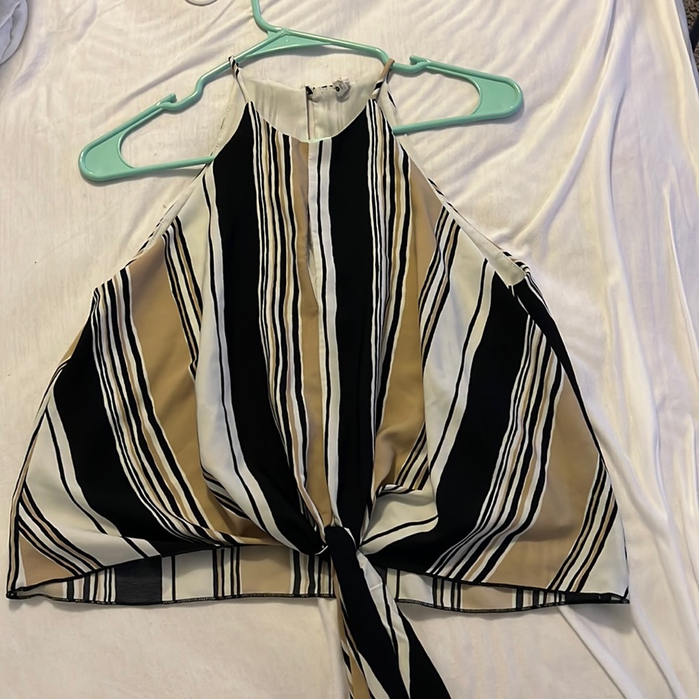 Black , white and tan top . Size small